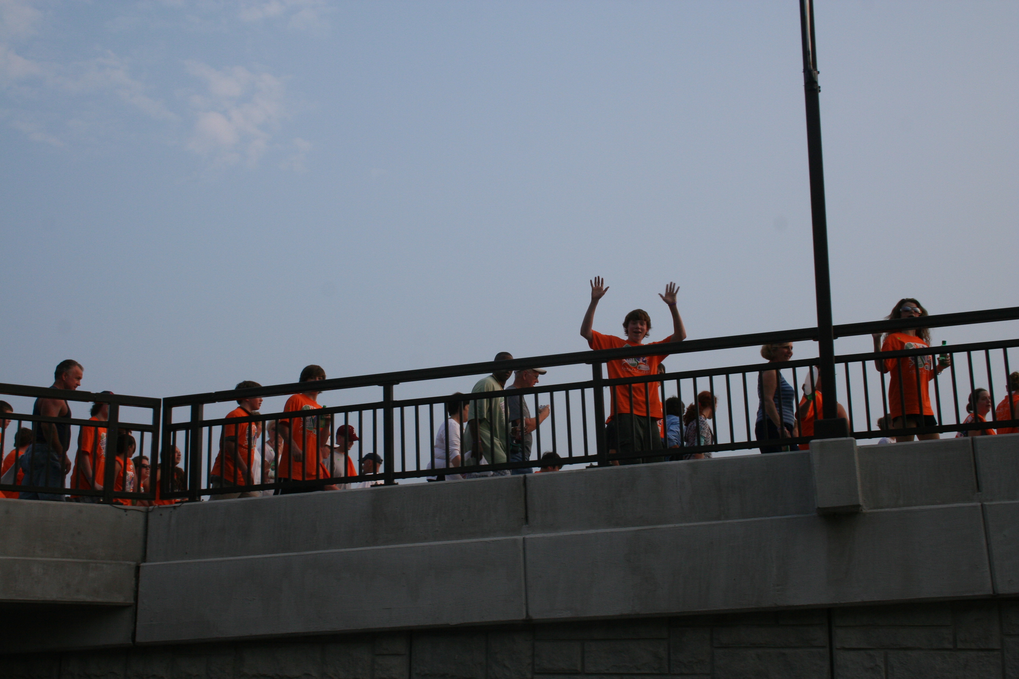 Some youngsters start the long trek across the Big Dam Bridge.