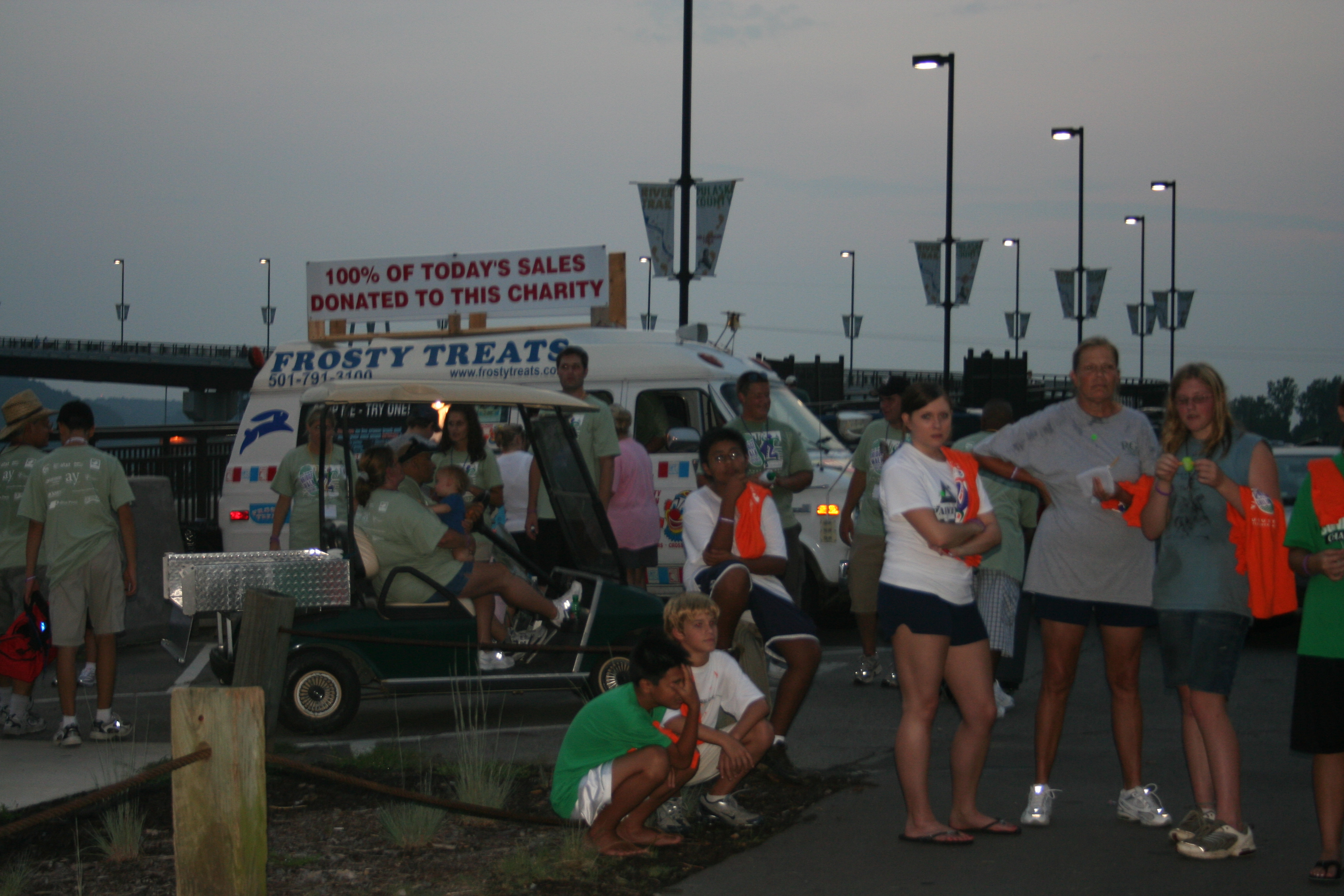 The walkers enjoy their free ice cream treats.