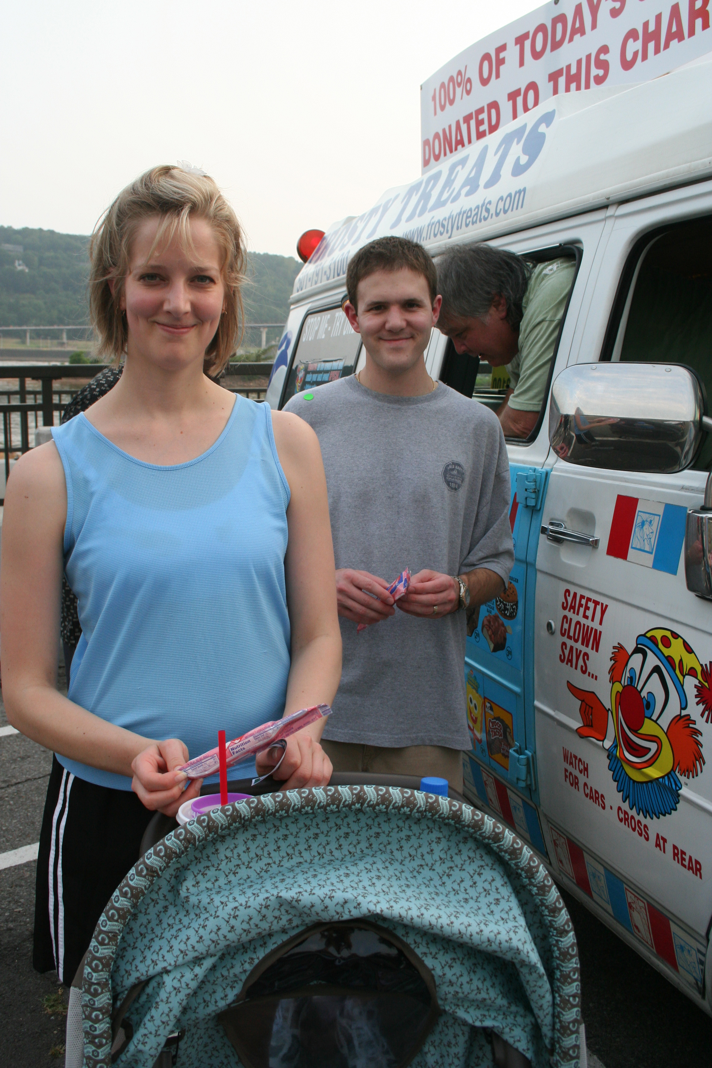 Chassie and Brent Sharpmack get a free frozen treat at the event.