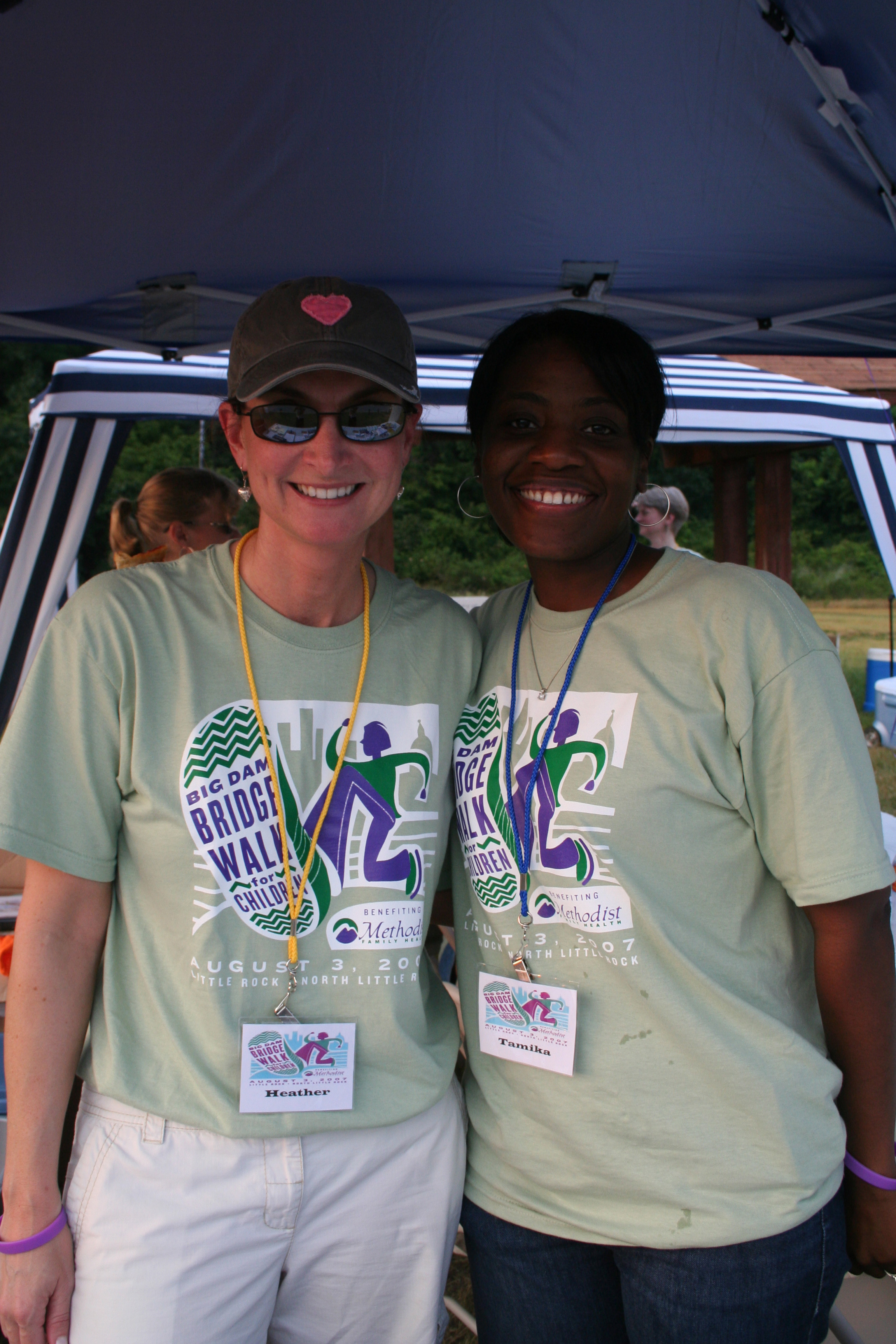 Heather Nelson and Tamika Edwards work the info booth.