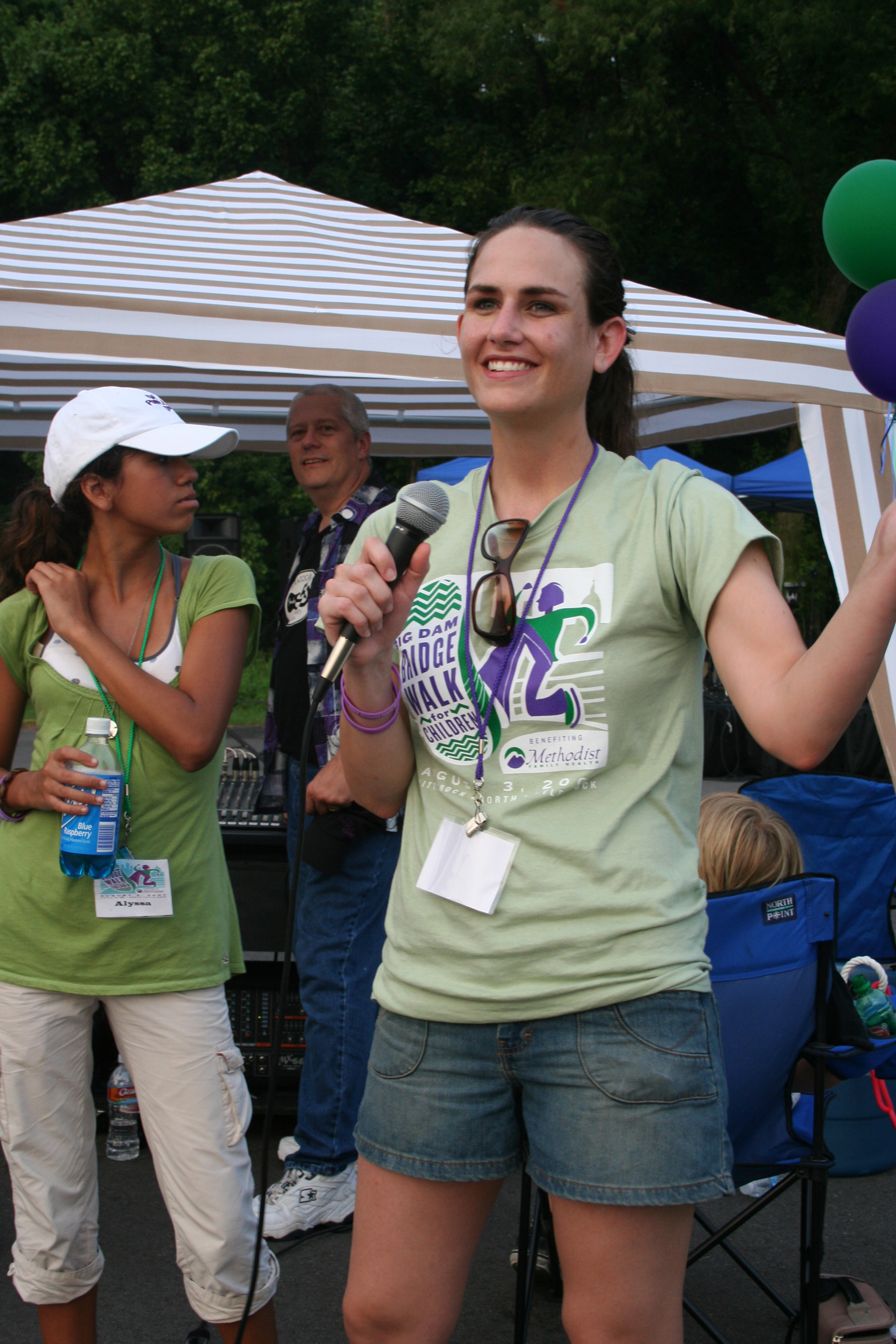 Event coordinator Maggie Beeler addresses the crowd.