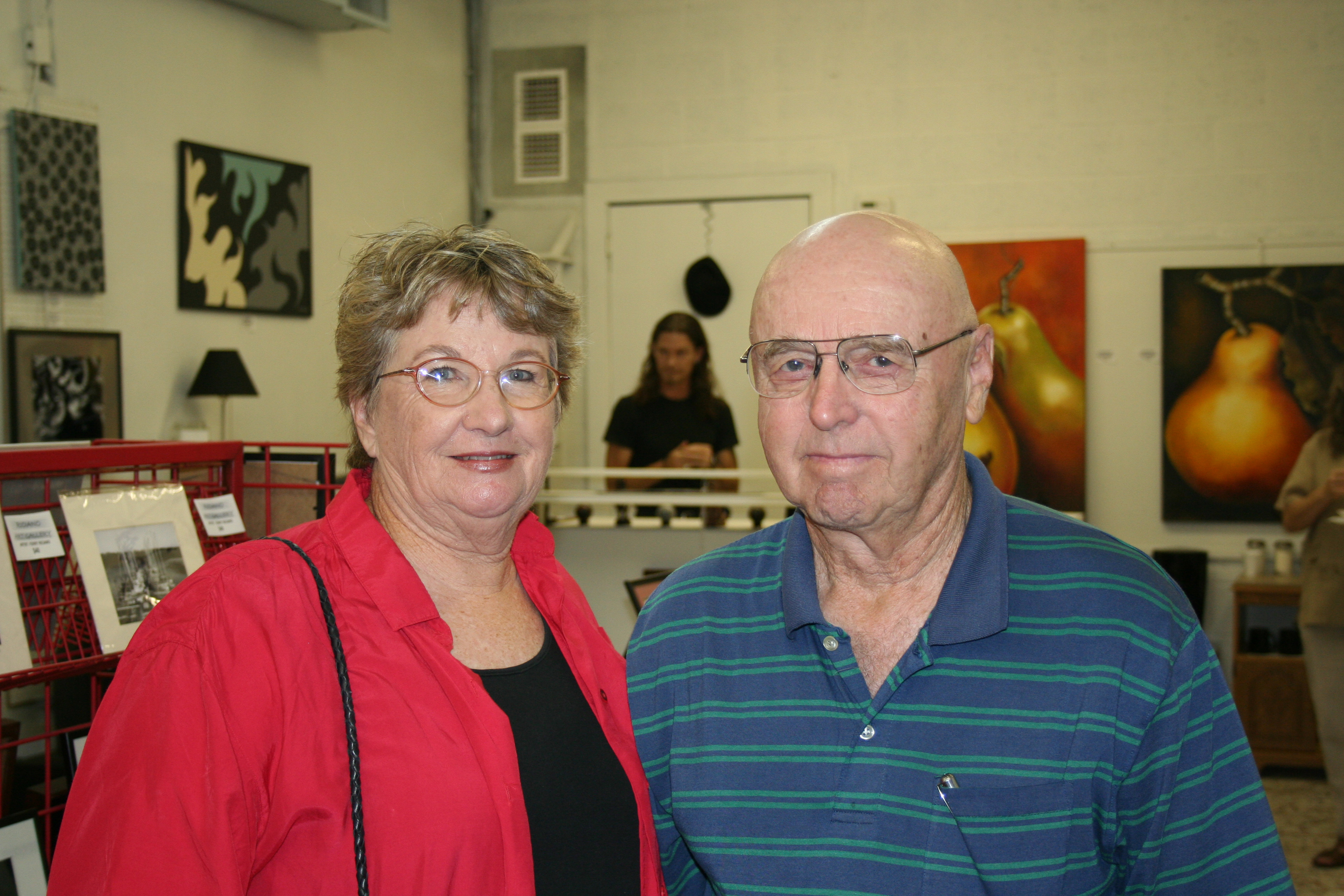 Janice and Marvin Crummer of Vilonia check out the pieces during "Art After Hours" on Saturday at Riciano Art Gallery in Conway.