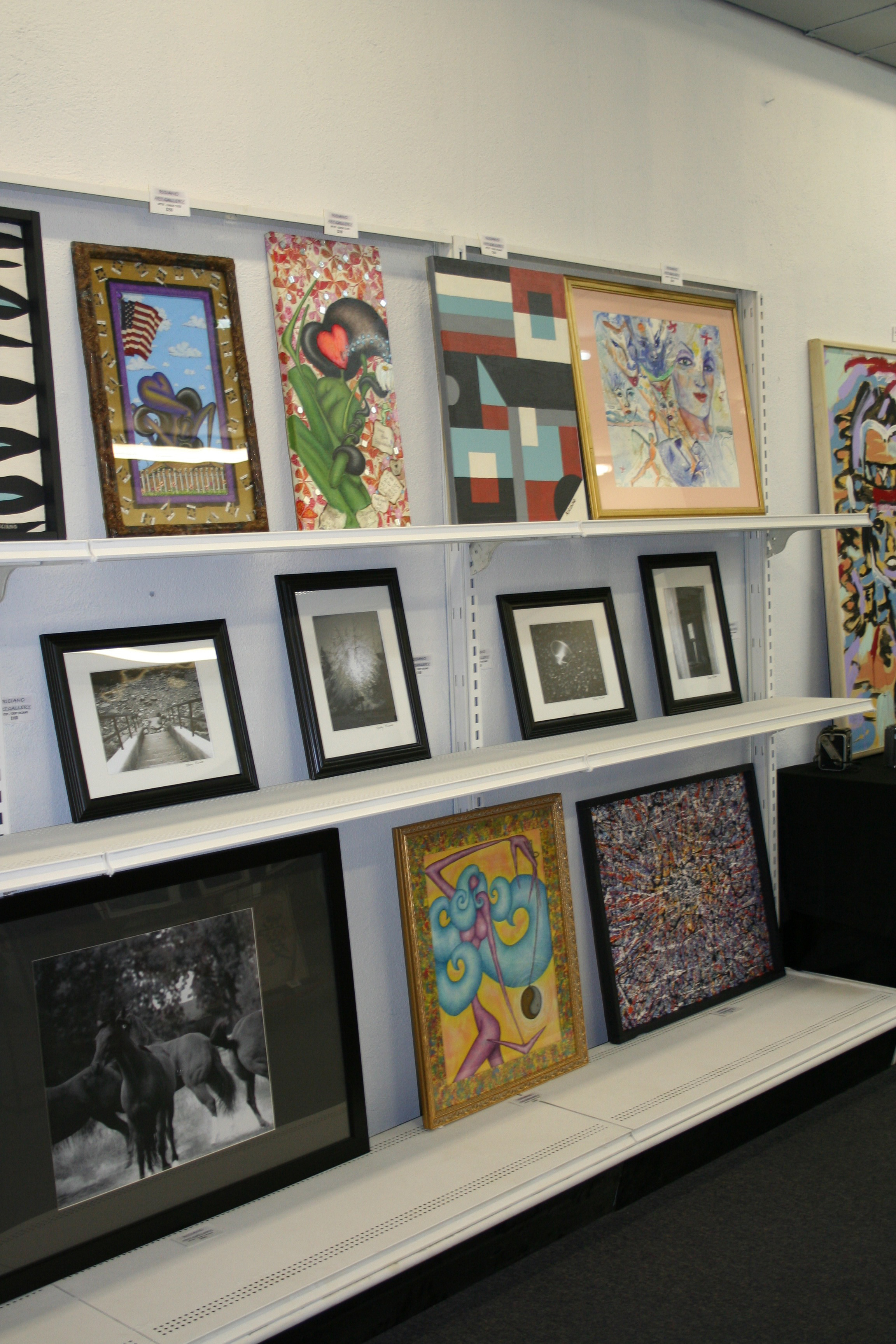 A sampling of photographs and paintings on view at Riciano Art Gallery in Conway.