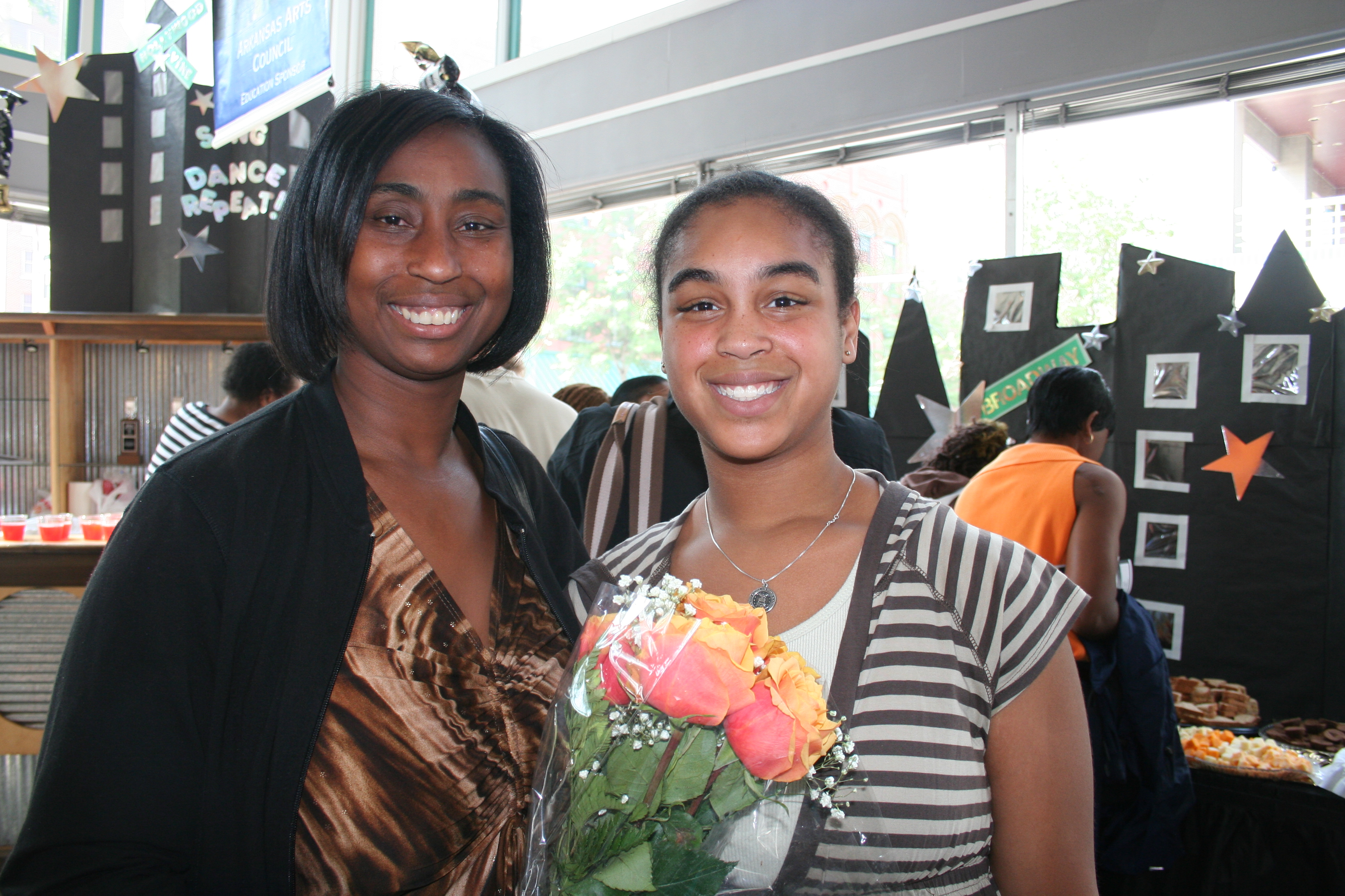 Gracie Newman with daughter Ashley Newman bring flowers for a friend in the show.