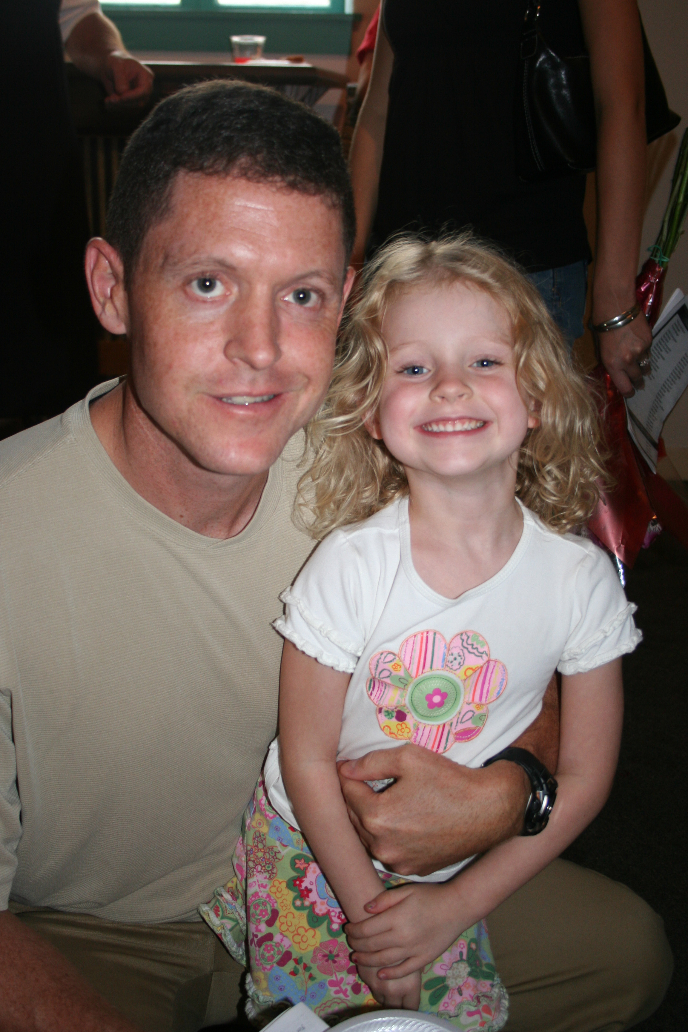Ryan Guiberson and daughter Molly Guiberson enjoy the party.