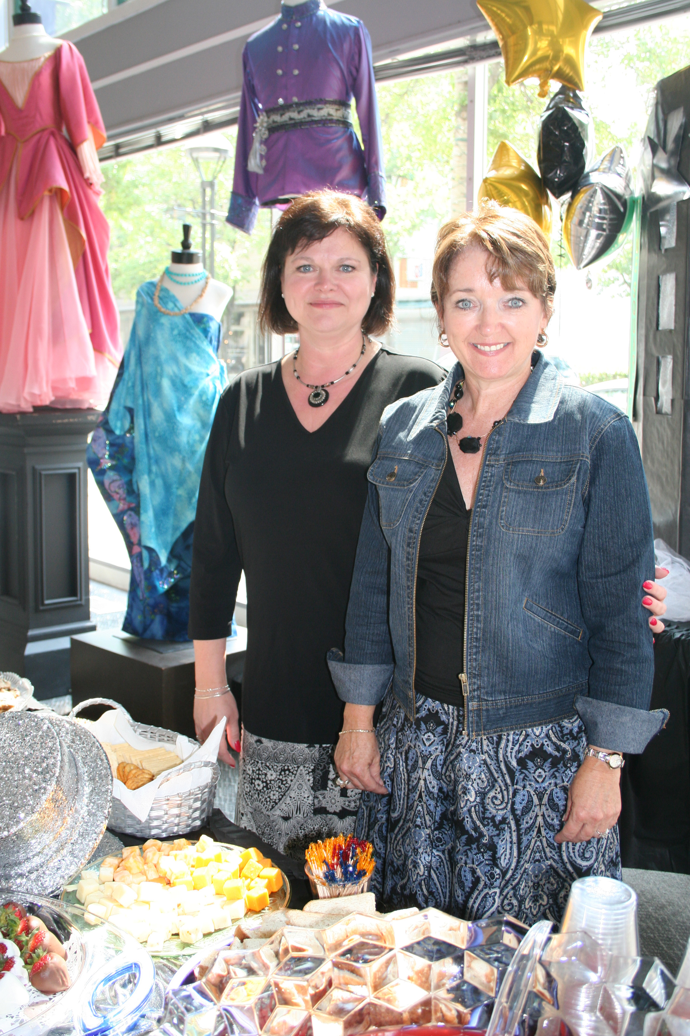 Kathleen Wilson and Mary Meacham serve at the reception.