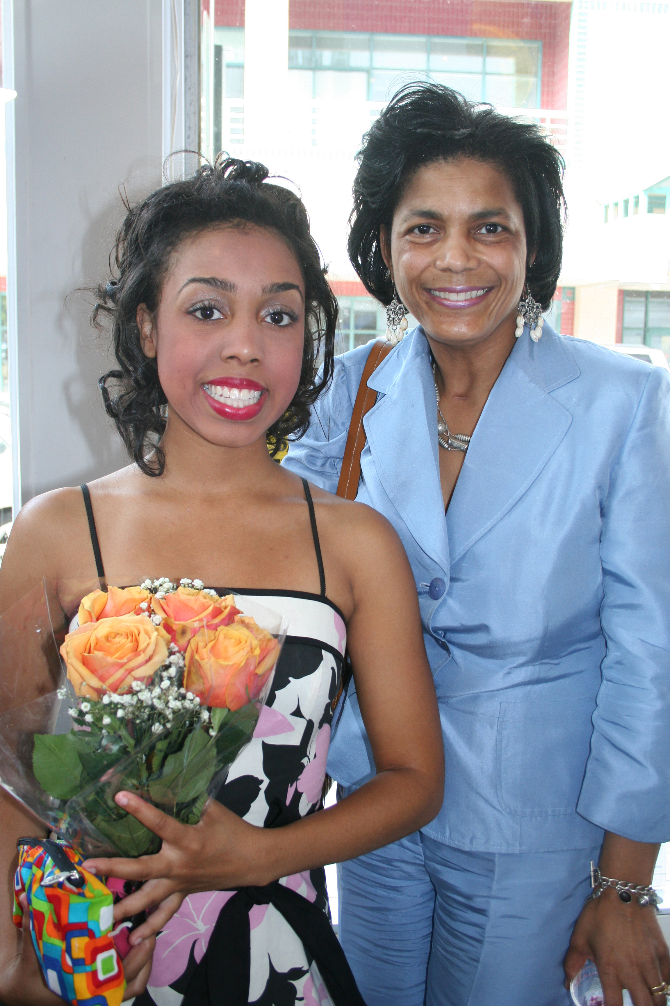 Kelsey Newman gets support and flowers from her family, including Regina Stewart Hampton.
