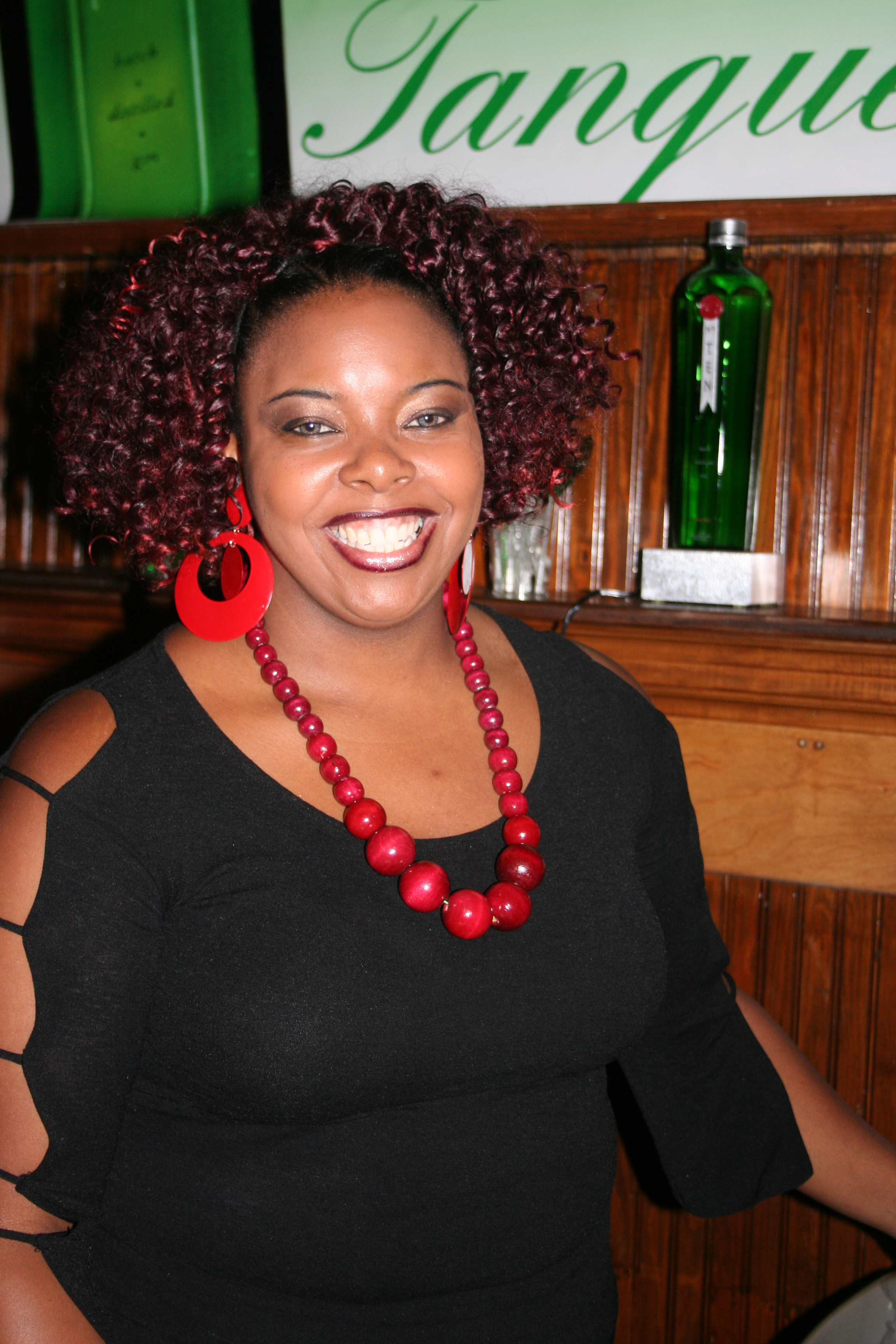 Slushy tends the bar with a smile.