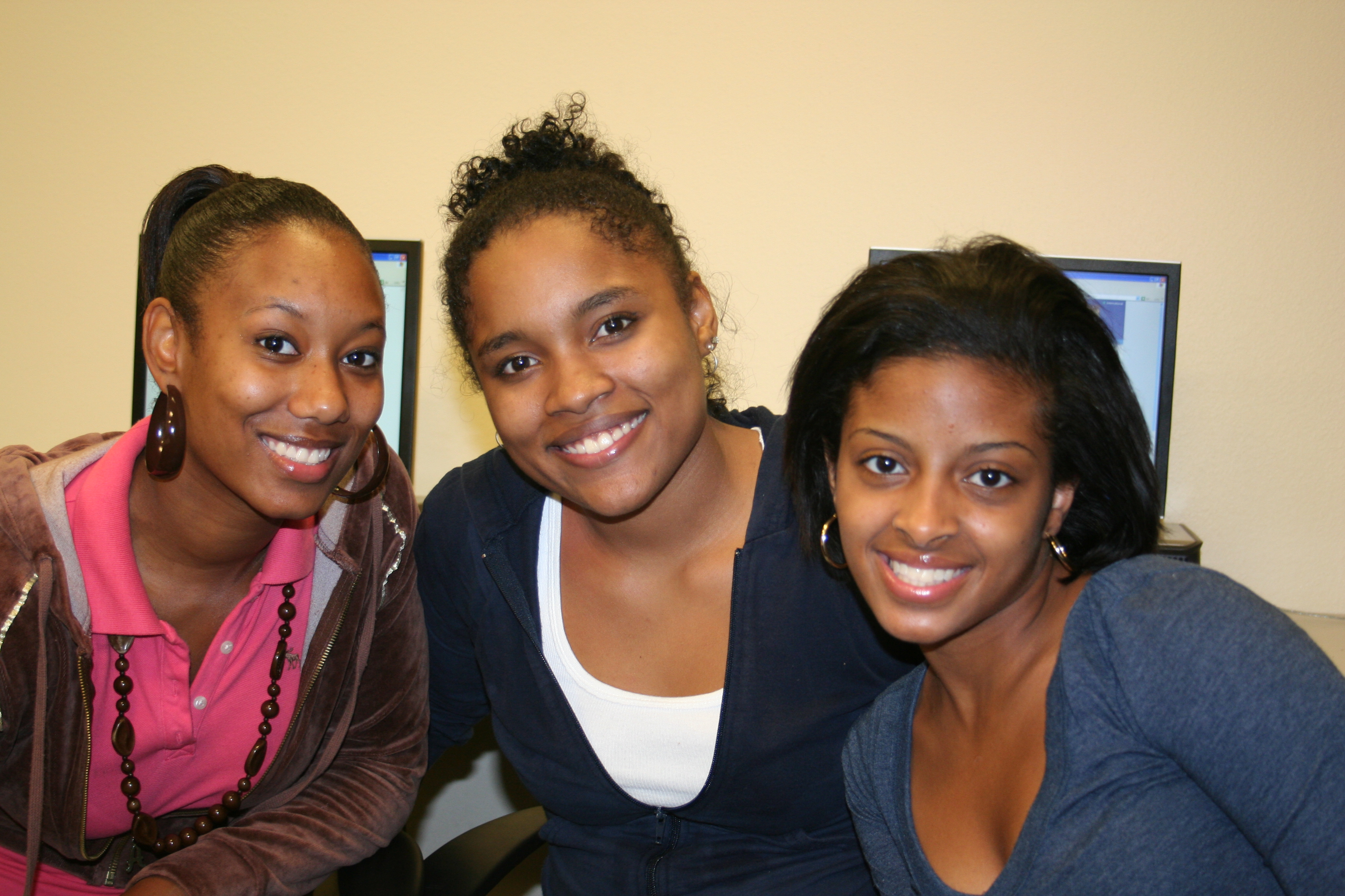 Aareon Hillery, Adelia Hill and Alyssa Welch hang out in the computer lab.