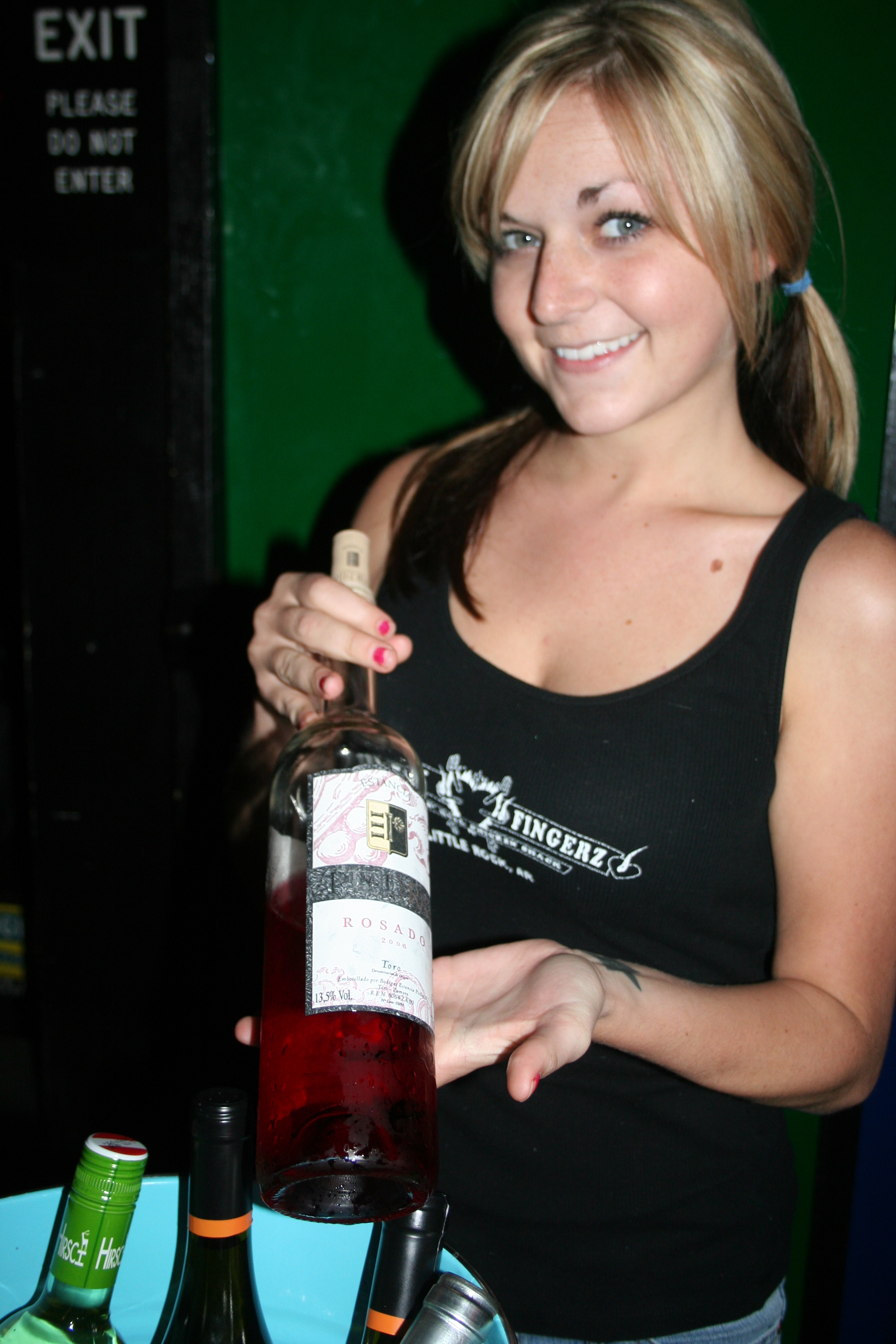Bevin shows off the wine for tasting.