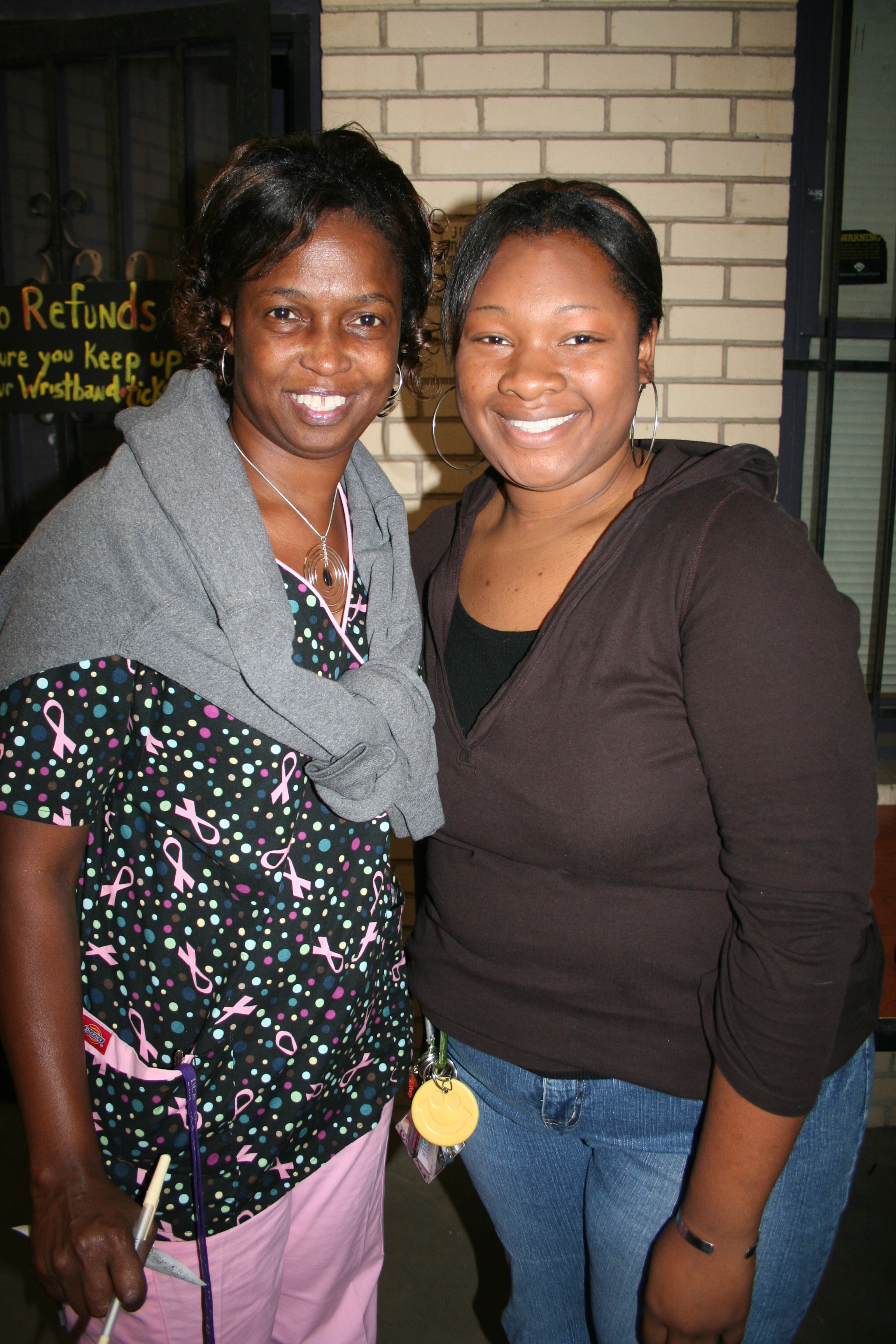 Veronica Bland and Roshunda Davis volunteer at the front door.