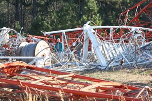 A KATV, Channel 7, signal tower lies crumbled after collapsing Friday south of Redfield.