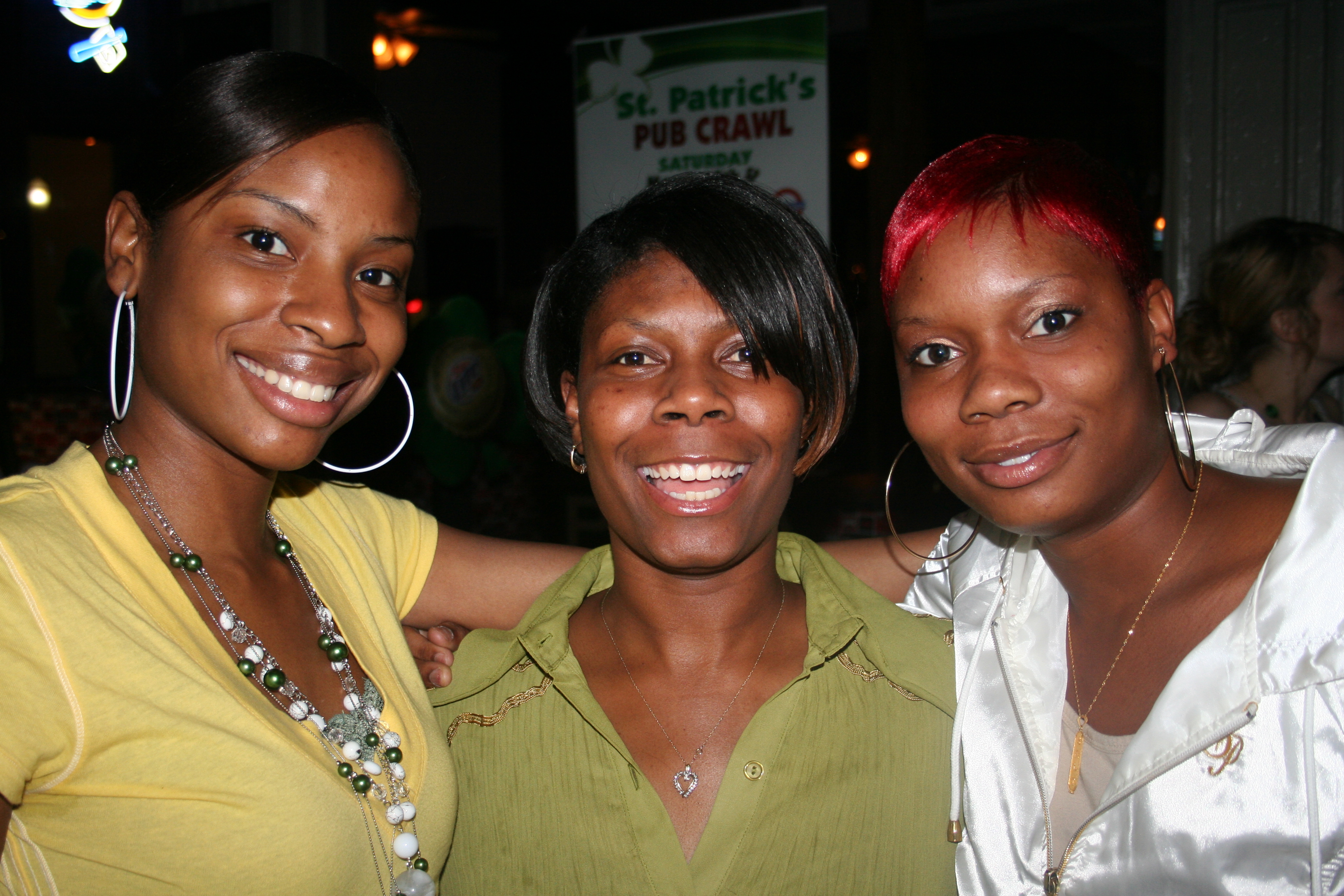 Porsche Fitch, April Hannah and Samantha Ervin party in the Rivermarket for the pub crawl.