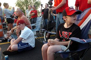Michael Munson, 11, is decked out in his Arkansas State University apparel to watch the implosion of the Seminole Twin Towers early Sunday in Jonesboro.