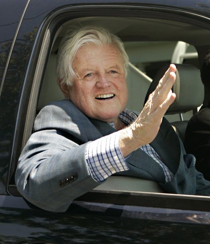 Sen. Edward M. Kennedy, D-Mass., waves toward members of the media from a car at the Kennedy family's compound, in Hyannis Port, Mass., in this May 2008 file photo.