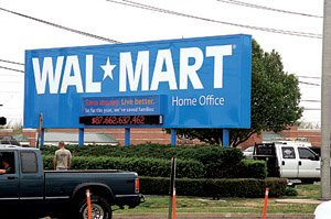 The sign for Wal-Mart Stores Inc. headquarters in Bentonville is shown in this file photo. 