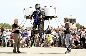 Harrison Martin takes a jet pack for a test flight last week at the Experimental Aircraft Association's annual fly-in at Oshkosh, Wis.