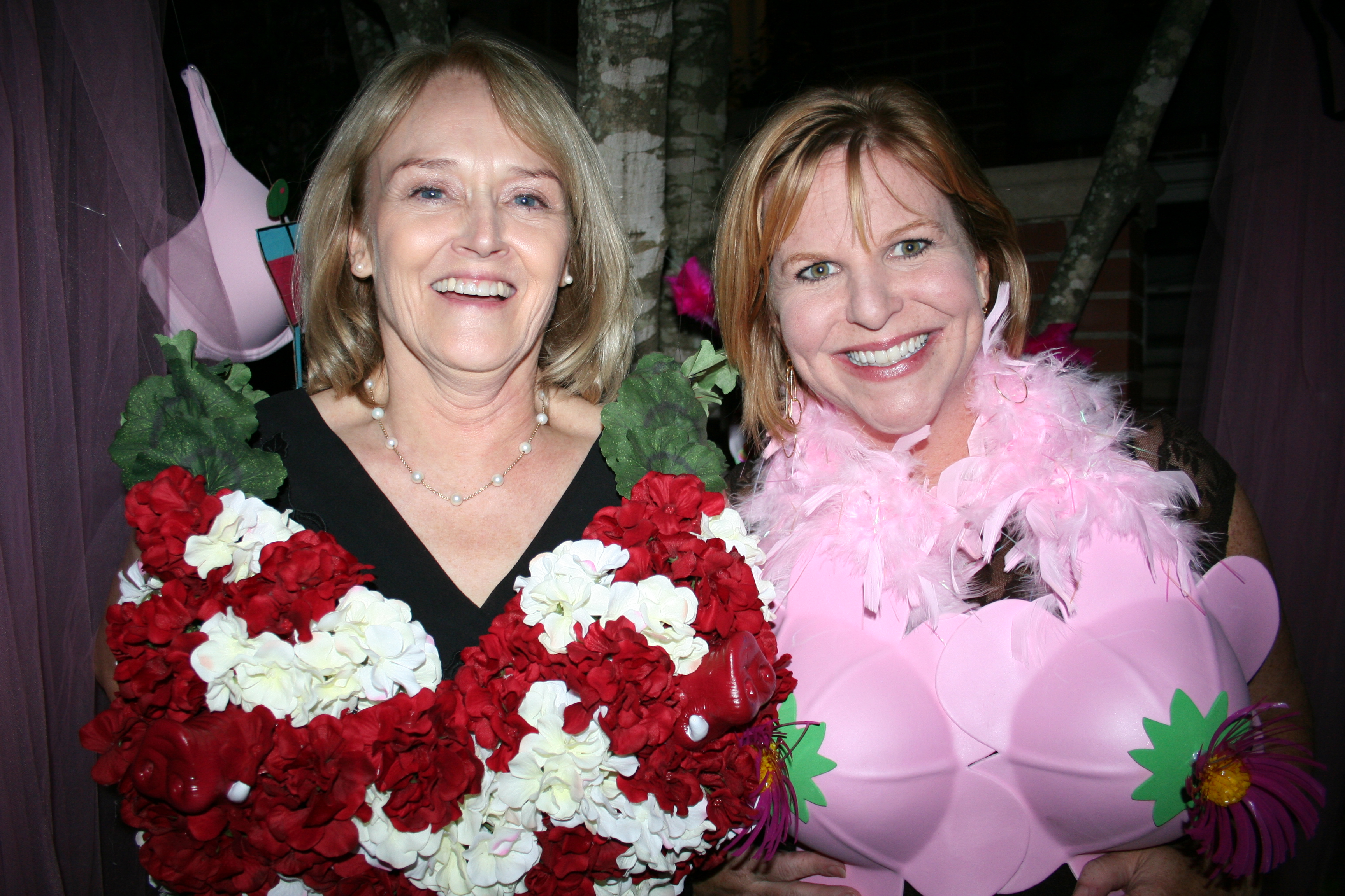 46. Sherry McBryde and Ann Brown try on the fashionable bras for the party.