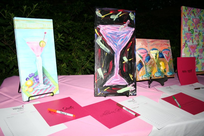 13. Silent auction items include art of martinis by local artists.