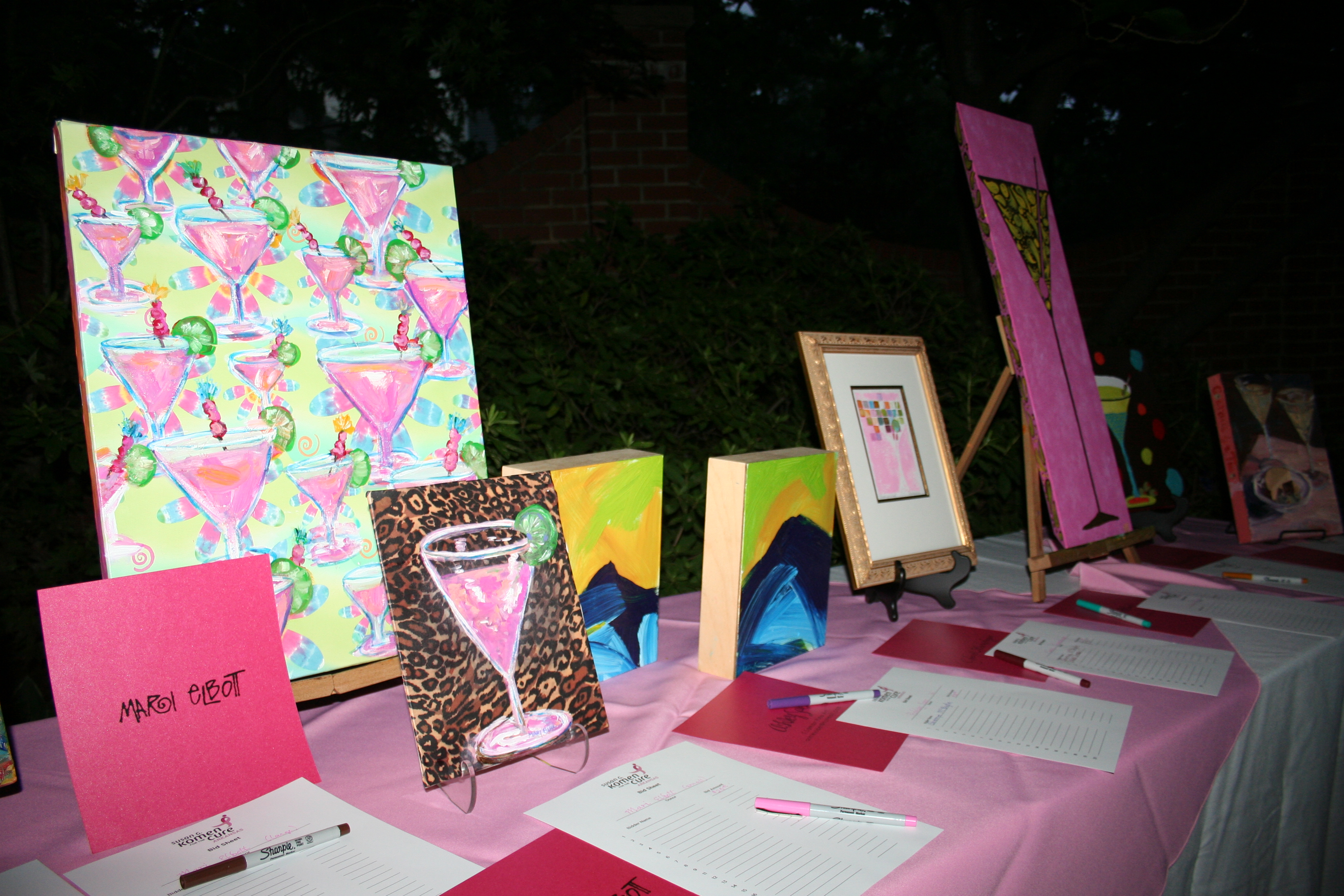 14. Silent auction items include art of martinis by local artists.