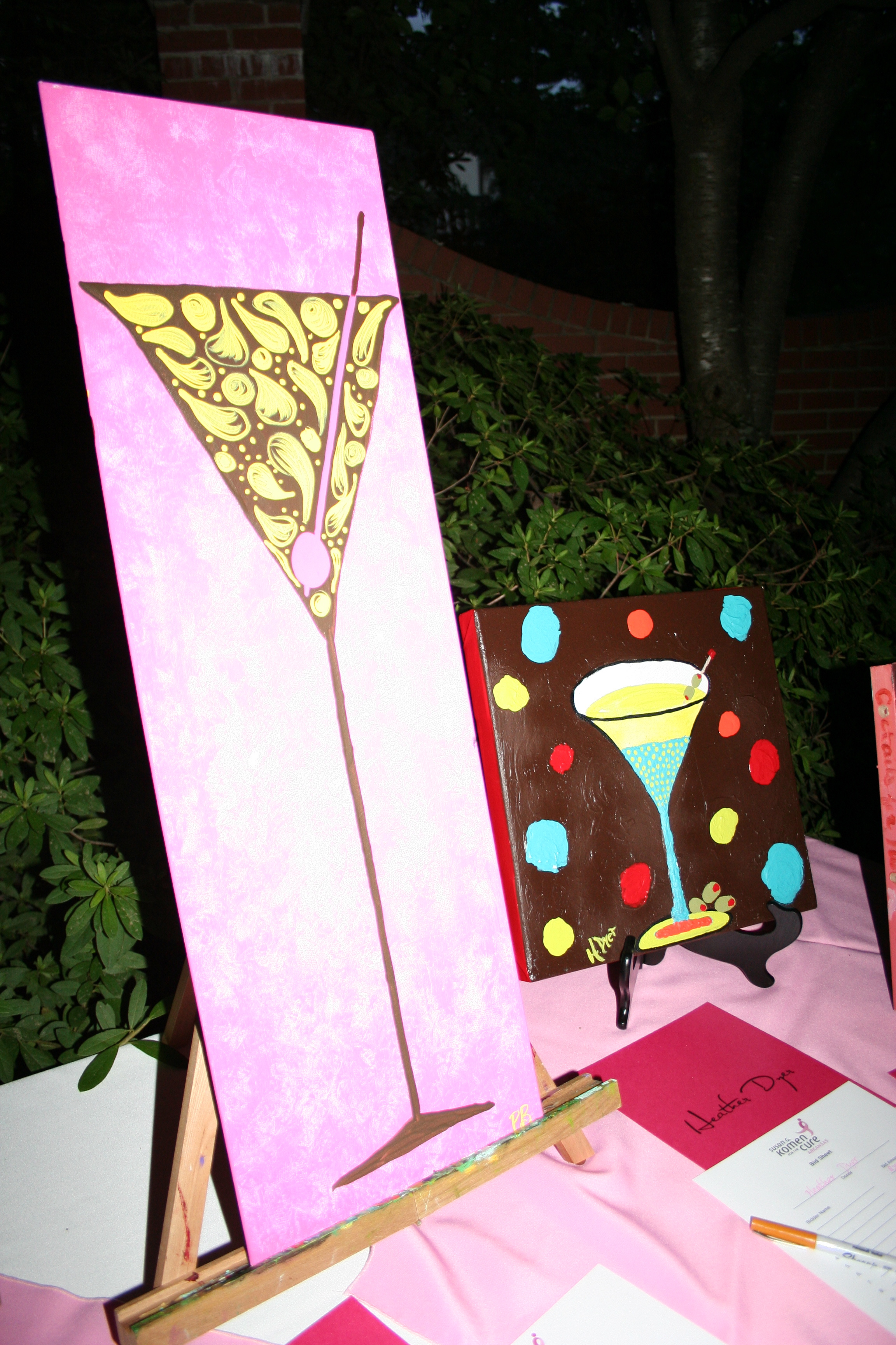 15. Silent auction items include art of martinis by local artists.