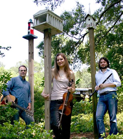 Legacy is Don Penzien (from left) on guitar, bodhran, whistles and vocals;
Valerie Plested on fiddle and vocals; and Justin Murphy on flute,
whistles, guitar, bodhran and vocals.