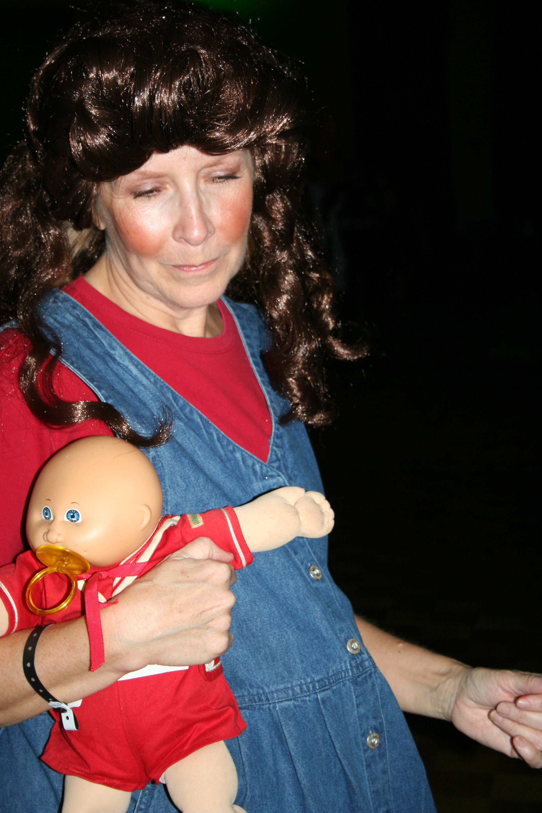 "Mama Duggar" on the dancefloor with one of her babies.