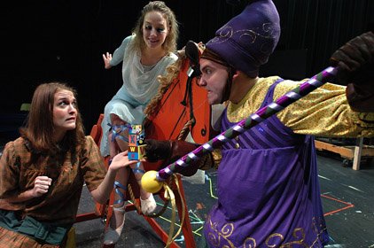 Would-be apprentice Libby (Katherine Campbell, from left) works around shop supervisor Mr. Pricket (Shawn Michael Cox) as creative sprite Spark (Kristy Barrington) looks on in The Toymaker's Apprentice at the Arkansas Arts Center Children's Theatre.