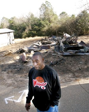 Terry Manning, whose aunt lives across from a burned house on Renfroe Street, talks about suspicious fires in the Magnolia neighborhood.