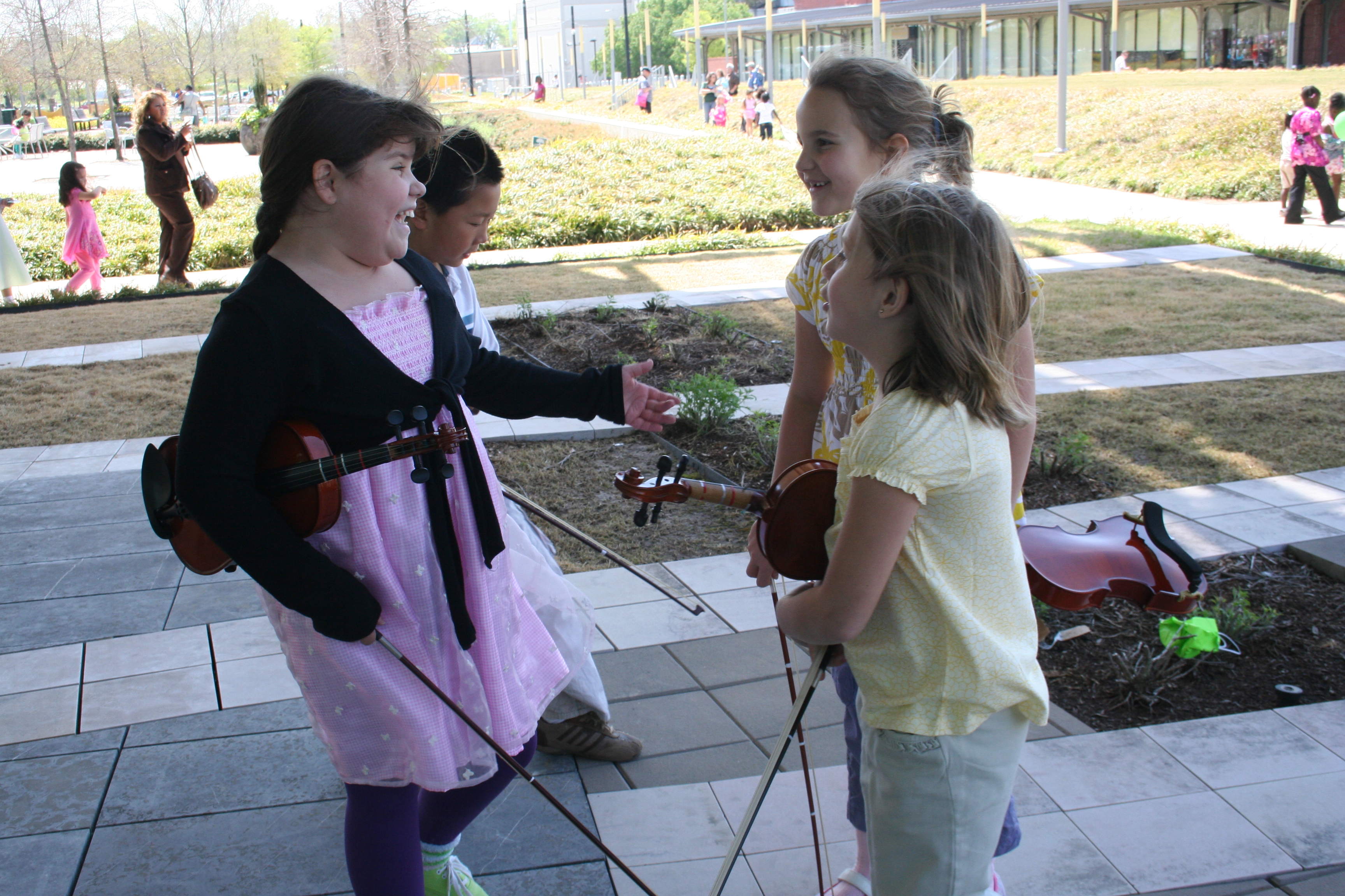 Youngsters kid around before their performance.