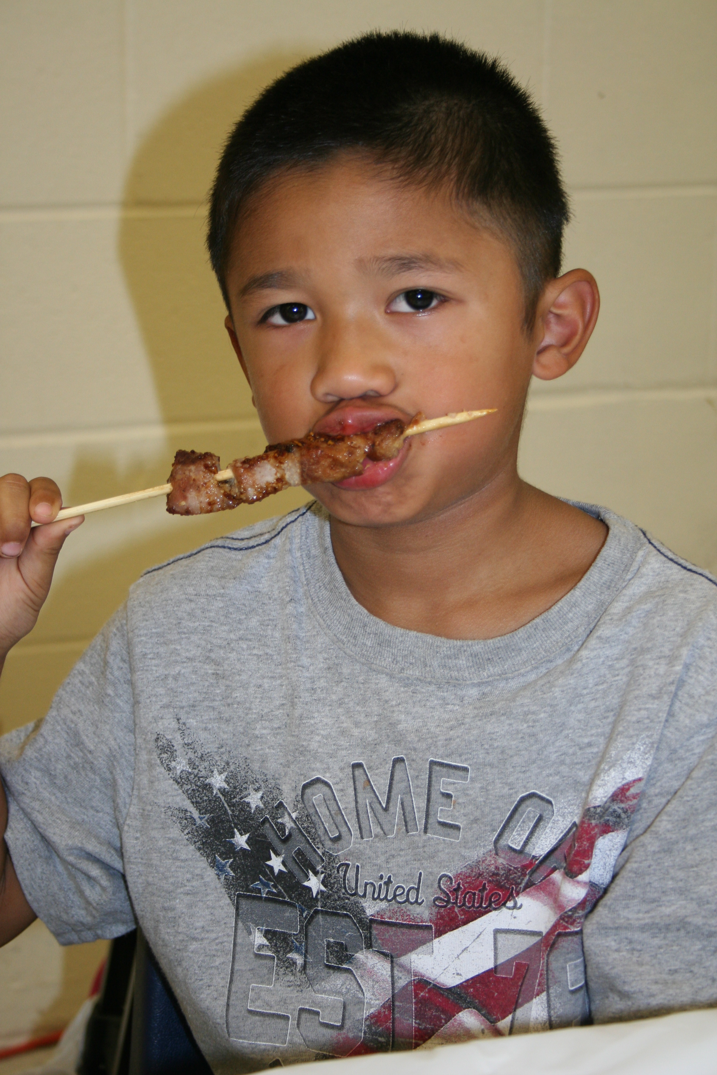 Jonathan Aranda enjoys a kabob