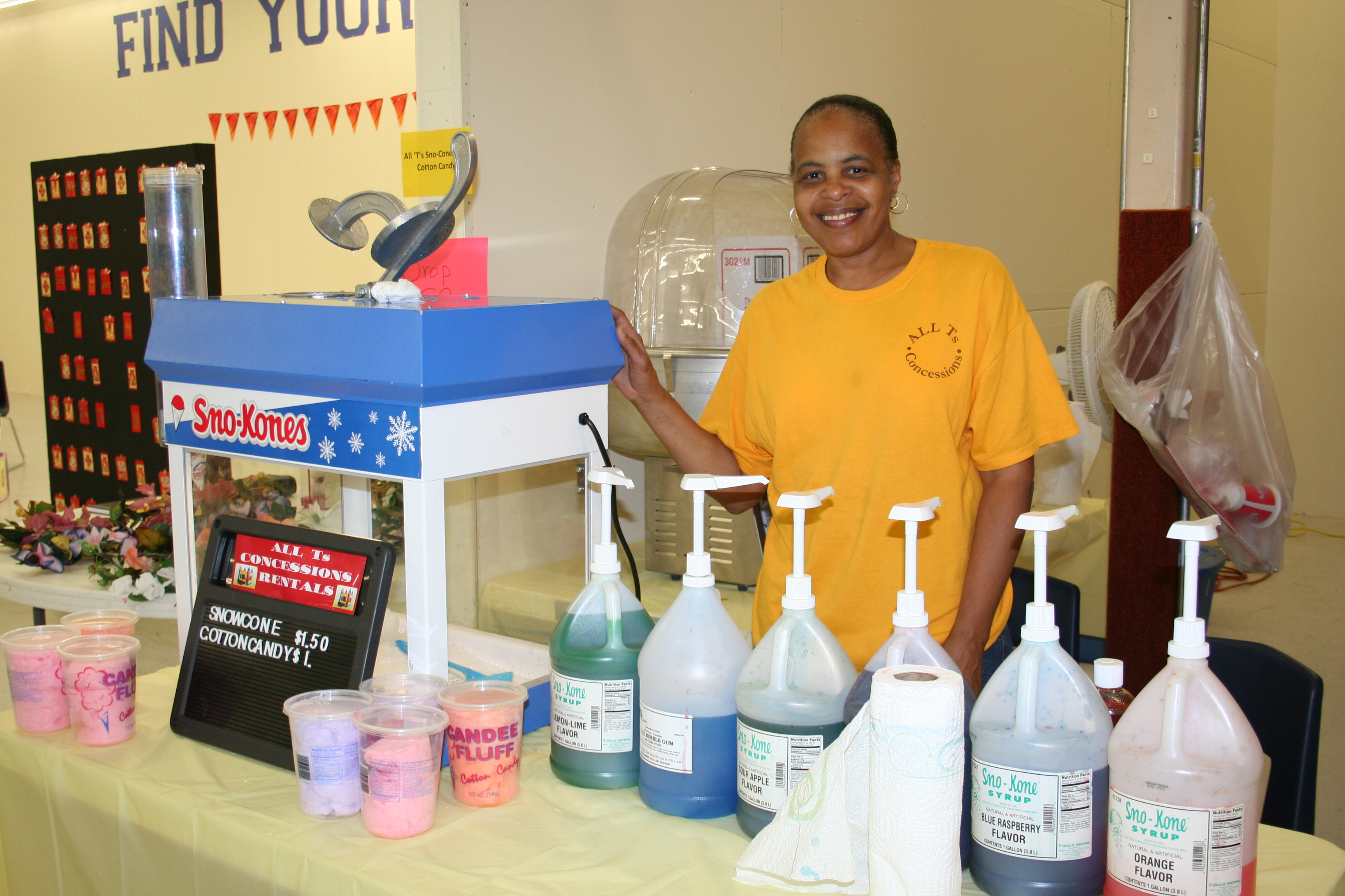 Dee Anderson sells sno cones for All Ts Concessions.
