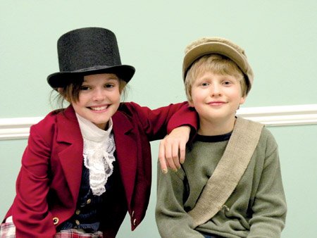 Mary Nail, 11, left, will play the Artful Dodger, and Marshall Bellando, 10, will perform as Oliver in the play of the same name performed by the Conway Dinner Theater.