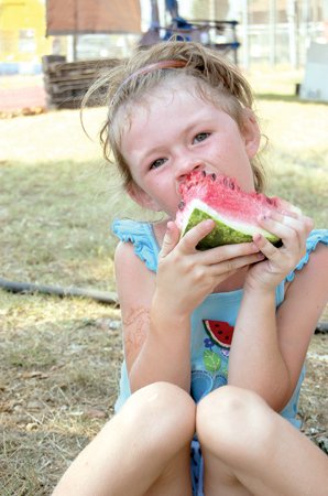 Haley Adams enjoys a big slice of watermelon at the 2007 Cave City Watermelon Festival. This will mark the festival's 30th year. It is scheduled for Thursday, Aug. 6, through Saturday, Aug. 8.