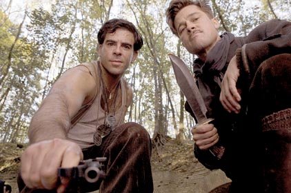 Sgt. Donny Donowitz (Eli Roth) and Lt. Aldo Raine (Brad Pitt) take revenge on Hitler's SS troops in Nazi-occupied France in Inglorious Basterds.