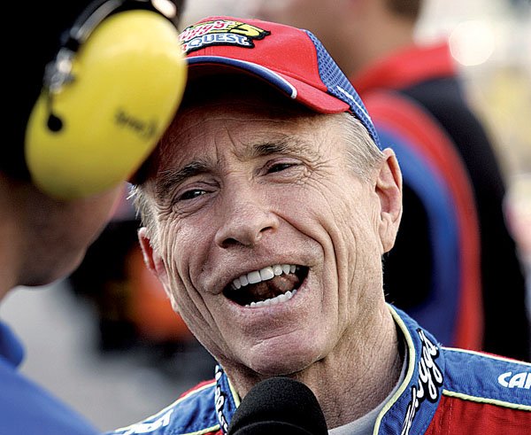 A happy Mark Martin is interviewed after finishing his qualifying laps for the NASCAR Sprint Cup Series Sharpie 500 auto race in Bristol, Tenn., on Friday.