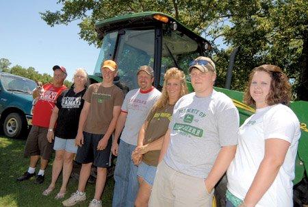 The Michael Darr family of Dardanelle is the 2009 Yell County Farm Family of the Year. The family includes, from left, Mike's stepdad, Marvin Casey, and his mother, Elaine Casey; Dusty Darr; Mike and Phyllis Darr; and Michael Darr Jr. and his wife, Jessica. The Darrs raise hogs, poultry, cattle and hay.