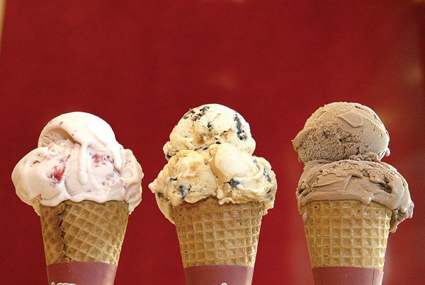 Ice-cream flavors at the Haagen-Dazs shop on R Street in the Heights neighborhood of Little Rock include (from left) strawberry, caramel and chocolate.