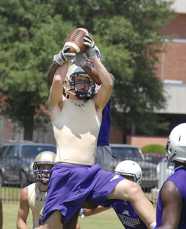 Senior tight end Chase Watson braces for impact as he hauls in a pass. 