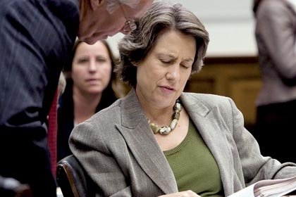 Federal Deposit Insurance Corp. Chairman Sheila Bair reviews notes before a hearing last year on Capitol Hill. 