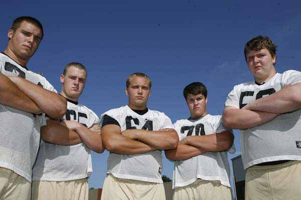 Offensive linemen (from left) Chase Petersen, Matt Hoffman, Jon Mark Holden, Jonathan Mortenson an
Marcus Danenhauer are one of the big reasons Bentonville is expected to be in the mix again for the Class
7A state championship.