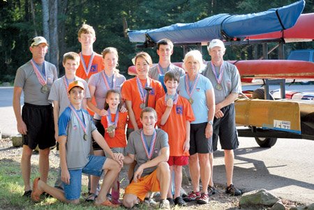 Winning medals at the United States Canoe Association National Canoe and Kayak Championship in Warren, Penn., earlier this month were coach Don Walls, back row from left, Luke Sayger, Thomas Sayger and coach Dale Burris; Joshua Sayger, middle row from left, Ruth Sayger Perkins, Arisa Ohhara and coach Becky Burris;  Philip Sayger, from row from left, Ariel Sayger, Mark Sayger and Matthew Sayger.