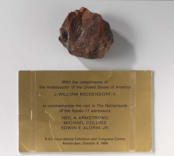 A photo released Thursday by the Rijksmuseum in Amsterdam shows a rock supposedly brought back from the moon in 1969 and a note from then-U.S. Ambassador J. William Middendorf.