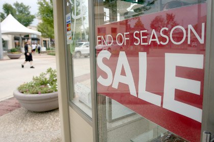 A sign at Eye Candy at Pinnacle Hills Promenade in Rogers announces a sale. 