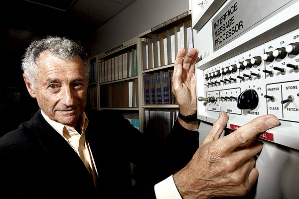 Internet pioneer Len Kleinrock poses last week next to an Interface Message Processor, a device used to develop the Internet.