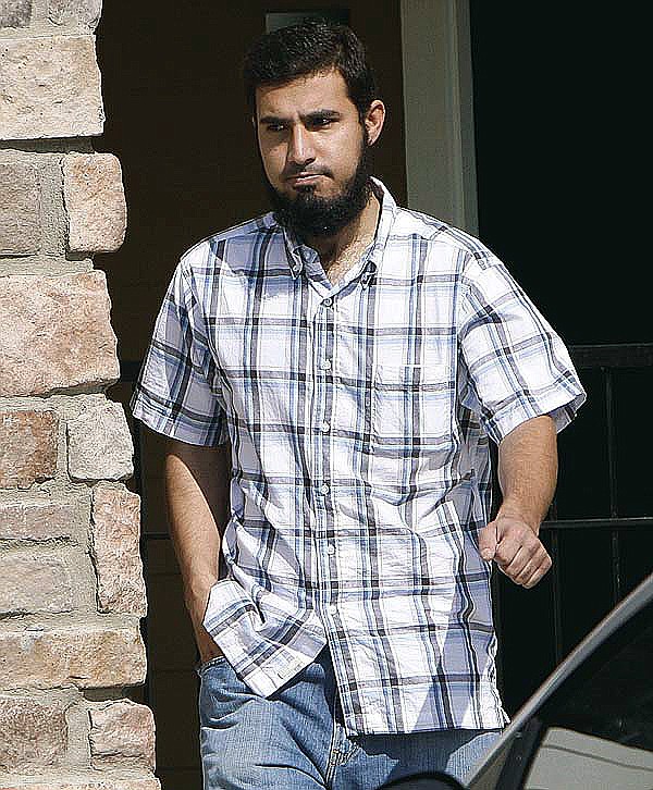 Najibullah Zazi leaves his
apartment in Aurora, Colo.,
for a meeting with his attorney
Thursday.