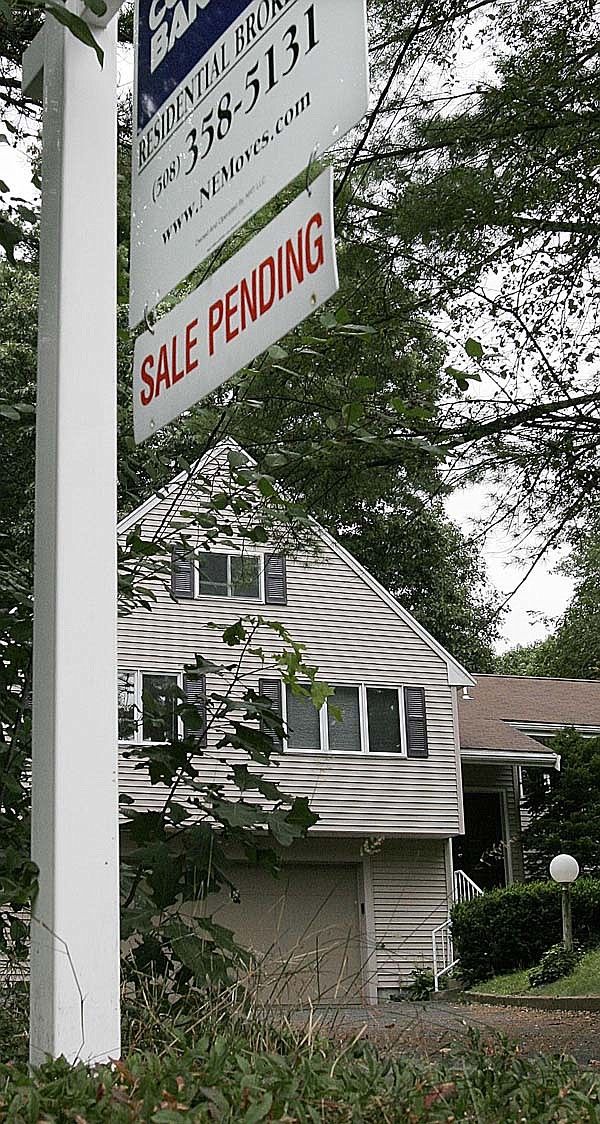 A sale is pending on this home Sept. 11 in Wayland, Mass. A government index shows home prices rose slightly in July.