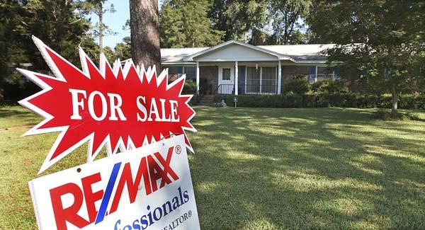 A house is shown for sale Wednesday in Tallahassee, Fla. Home sales dipped in August after a four-month streak of gains.