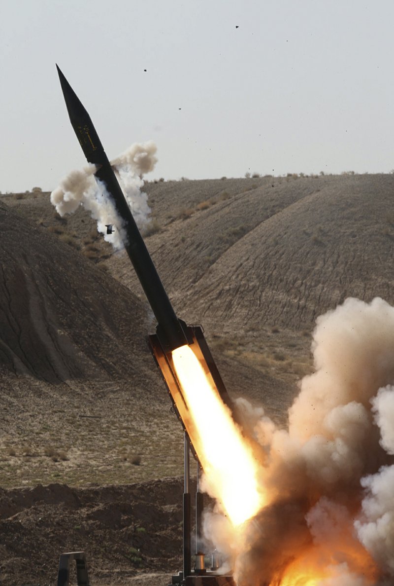 The Iran Revolutionary Guard's Tondar missile is launched in a drill Sunday near the city of Qom, 80 miles south of Tehran, in this photo released by the Iranian semi-official Fars News Agency.