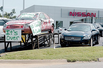 Northwest Arkansas auto dealers, like Superior Nissan on College Avenue in Fayetteville, signaled the end of the "cash for clunkers" program in late August. 
